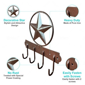 May include: Rustic brown metal key hook with four hooks and a decorative star design. The key hook is made of pure iron and is treated with a special power coating to prevent rust.