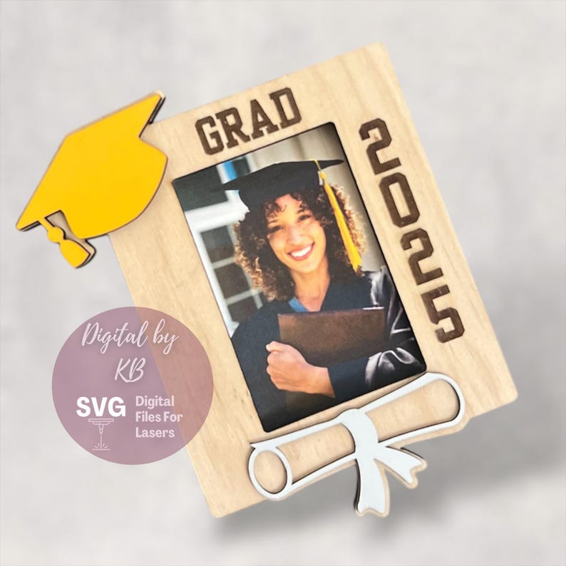 May include: A wooden picture frame with a graduation cap, diploma, and the year 2025. The frame is designed to hold a 4x6 inch photo. The text "GRAD" is printed on the frame.