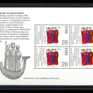 May include: A sheet of Irish postage stamps commemorating the 1300th anniversary of the martyrdom of three Irish saints. The stamps feature an illustration of the saints and the text "ÉIRE" and "28".