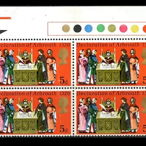 May include: Four postage stamps featuring a historical scene of the Declaration of Arbroath in 1320. The stamps are red with black and gold accents. Each stamp features the text "Declaration of Arbroath 1320" and "5d".