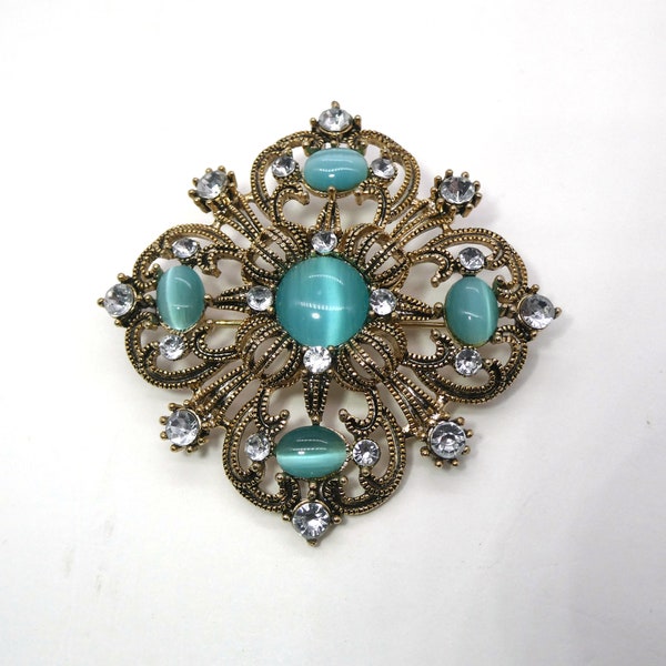 Vintage “Unsigned Beauty” Light Turquoise Cat’s Eye and Rhinestone Collectible Brooch