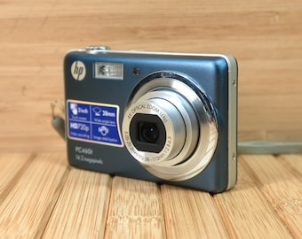 HP (Hewlett-Packard) PC460T 14.2MP Digital Camera, 4x Optical Zoom, Touch Screen