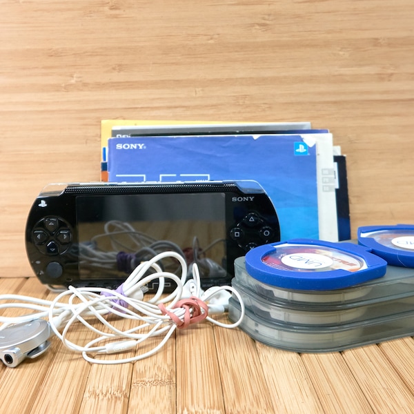 Sony PSP-1001 Playstation Portable Console Black, Bundle, with  Games, Movies, charger adapter, Remote Control, Headphones, and two Cases