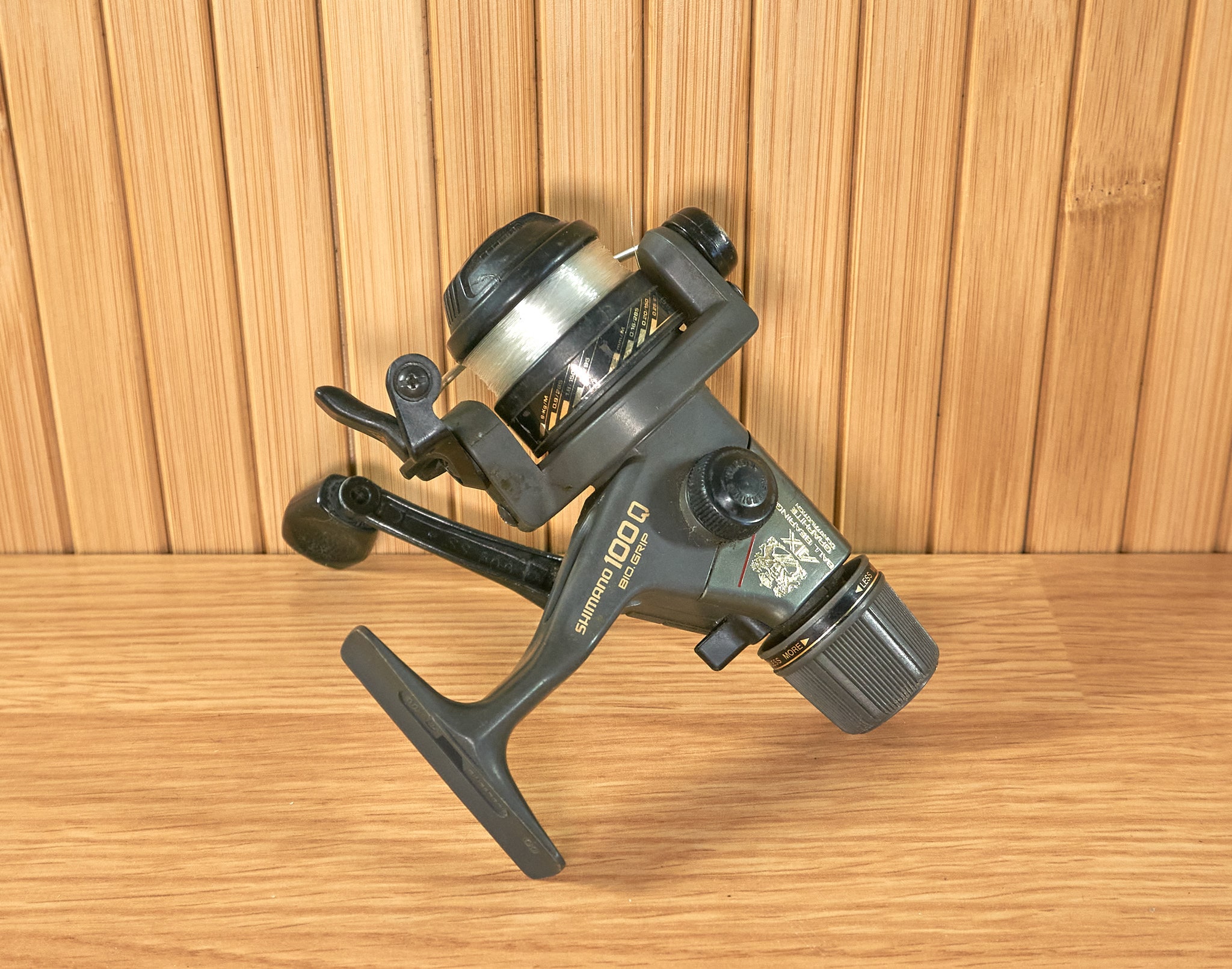 Vintage Shimano AX 100Q, Quick Fire II, Bio Grip Graphite Construction, Ultra  Light Spinning Reel, Made in Singapore -  Canada