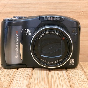 Canon PowerShot SX100IS 8 MP Digital Camera, with 10x Optical Zoom, Image Stabilization, Made in Japan image 2