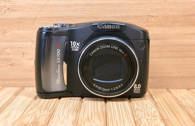 Canon PowerShot SX100IS 8 MP Digital Camera, with 10x Optical Zoom, Image Stabilization, Made in Japan image 2