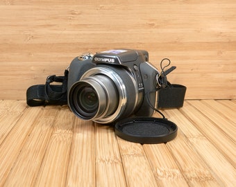 OLYMPUS SP-550UZ 7.1MP Digital Camera, 18x Optical Zoom, Image Stabilization