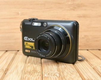 Casio High-Speed Exilim EX-FC100 9.1 MP Digital Camera, 5x Optical Zoom, Image Stabilized