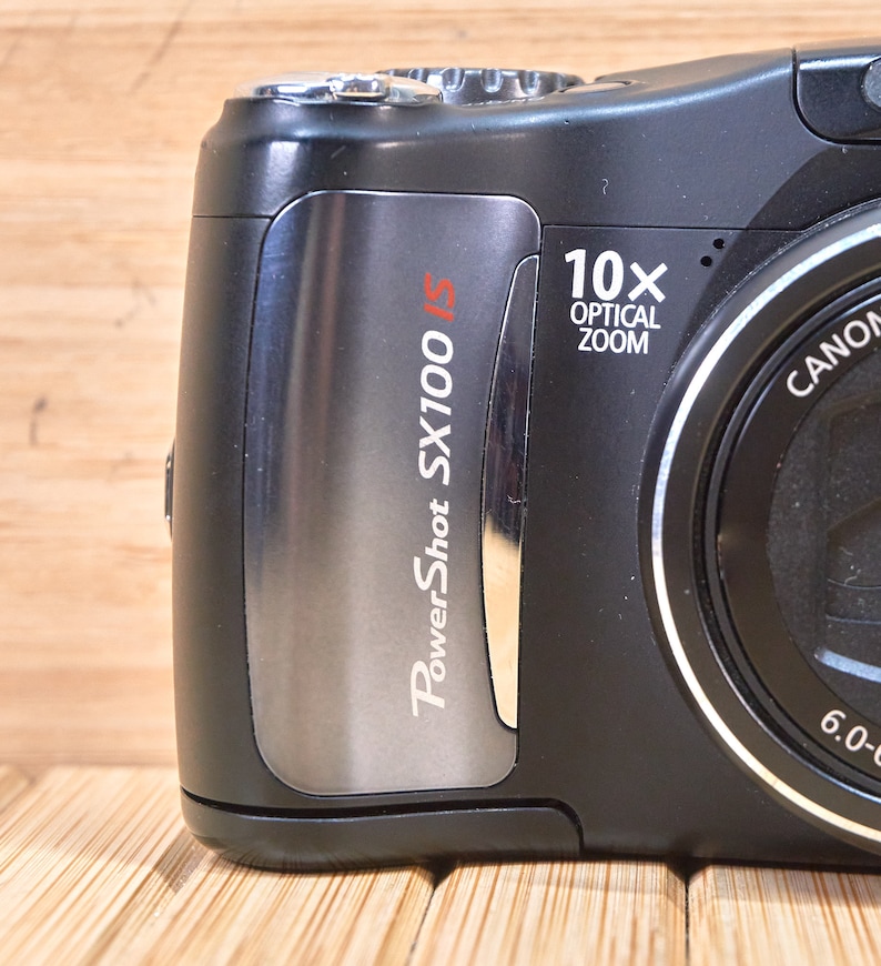 Canon PowerShot SX100IS 8 MP Digital Camera, with 10x Optical Zoom, Image Stabilization, Made in Japan image 3