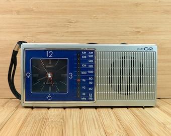 Vintage Sanyo RPM-C2 AM FM Clock, Portable Transistor Radio, Quartz Clock, Made in Singapore