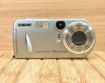 Sony Cybershot DSC P92 5MP Digital Camera, 3x Optical Zoom, Made in Japan