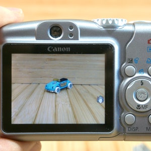 Canon PowerShot A710 7.1 MP Digital Camera, with 6X Optical Zoom, Made in Japan image 4