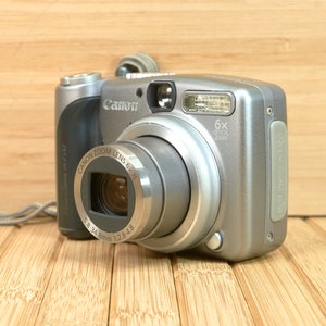 Canon PowerShot A710 7.1 MP Digital Camera, with 6X Optical Zoom, Made in Japan image 1