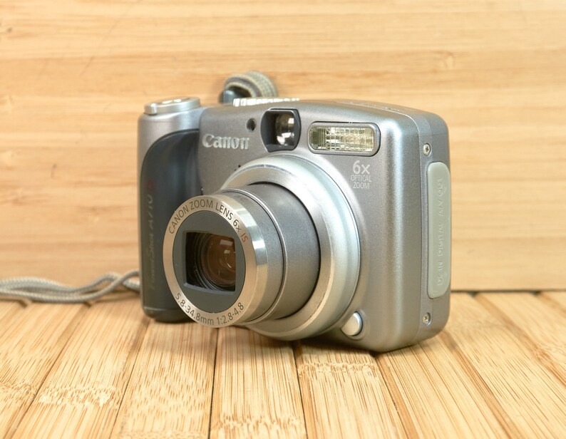 Canon PowerShot A710 7.1 MP Digital Camera, with 6X Optical Zoom, Made in Japan image 1