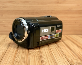 Sony HDR-PJ10 High Definition Handycam Camcorder, with Built-in Projector, Sony G Lens
