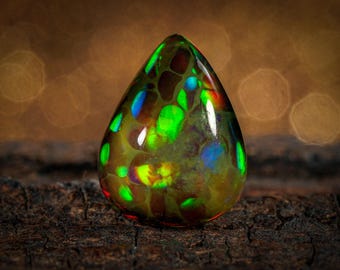 天然石 エチオピアオパール(opal) オーバルカボション 約 6x8mm 楽天市場】オパール【オーバルカボション】11.5x15.7x6.9mm 5.49ct