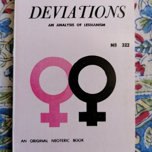 May include: A pink and black book cover with the title "FEMALE DEVIATIONS" and the text "AN ANALYSIS OF LESBIANISM". The cover also features a pink and black female symbol.
