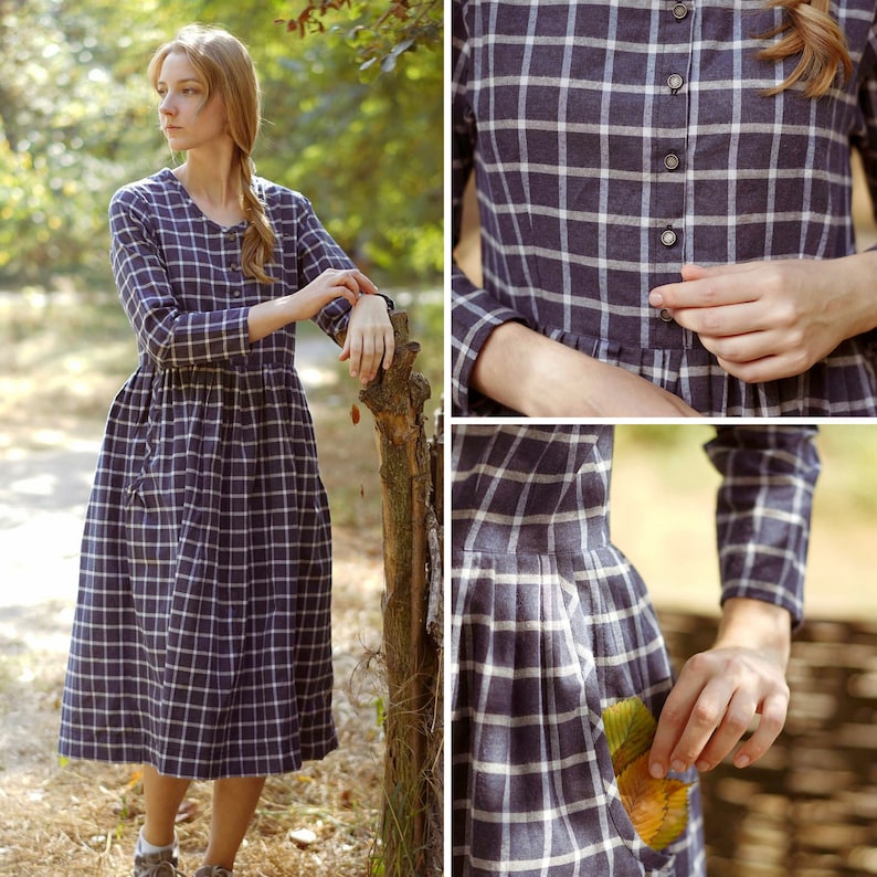 Puede incluir: Un vestido largo de manga larga, de cuadros azules y blancos, con botones en la parte delantera y bolsillos. El vestido es de largo hasta la rodilla y tiene una falda fruncida.