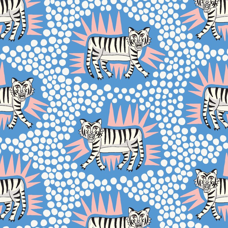 May include: A seamless pattern featuring white tigers with black stripes on a light blue background. The tigers are surrounded by pink and white sunburst shapes and white polka dots.