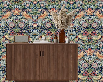May include: A dark wood cabinet with two doors and a patterned wallpaper background. The wallpaper features a repeating design of birds, flowers, and leaves in shades of blue, green, red, and yellow.