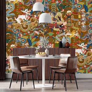 May include: A dining room with a wallpaper featuring a colorful and intricate design of dragons, flowers, and other mythical creatures. The wallpaper is set against a gold background. The room is furnished with a white table and six brown chairs.