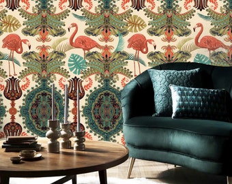 May include: A green velvet armchair with a patterned throw pillow sits in front of a wall covered in a cream-colored wallpaper with a repeating pattern of pink flamingos, green leaves, and intricate floral designs.