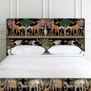 May include: A black and white patterned headboard with a jungle scene featuring giraffes, unicorns, tigers, and butterflies. The headboard is on a white bed with white bedding and a black and white patterned bed skirt.