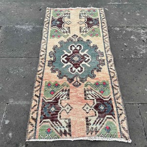 Small Vintage Turkish Wool Rug: Handmade Door Mat (1&#39;7 x 3&#39;3 ft)