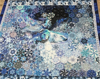 Handmade king size Polar Fairy One Block Wonder quilt that is 91 wide x 97 inches long. Colors are blue, gray and white and is 100% cotton.