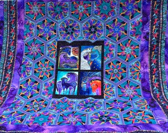 Queen size ‘Abstract Horses’ One Block Wonder handmade quilt that measures 83 x 92 inches long and in mostly purples and blues.
