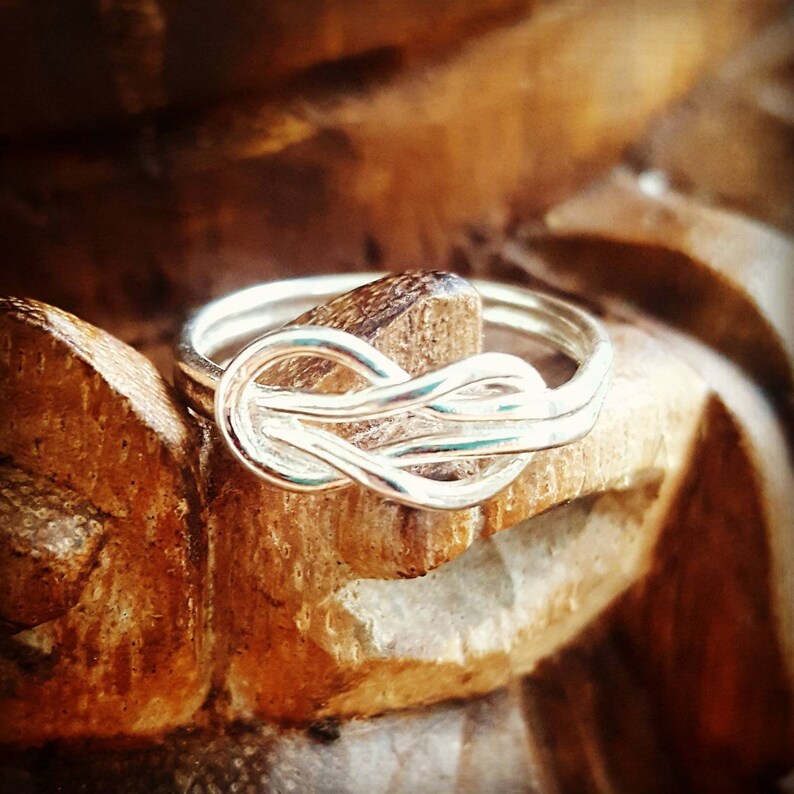 925 sterling silver love knot design stackable ring.