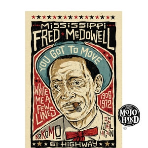 May include: A vintage-style poster featuring a portrait of Fred McDowell, a Mississippi blues musician. The poster is red, white, and blue with the text "Mississippi Fred McDowell", "You Got To Move", "Write Me A Few Lines", "Kokomo", "61 Highway", "1906", "1972", and "I'm In Jail Again".