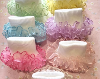 Pastel color embroidered scalloped ruffled socks for infants, toddlers, and girls.