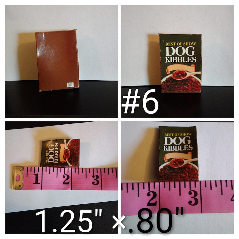 May include: Miniature dog food box labeled "Best of Show Dog Kibbles." The box is brown and green with a picture of dog food. The box measures 1.25 inches by 0.80 inches.