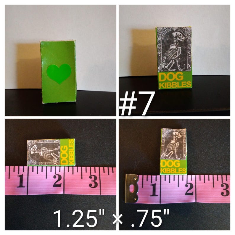 May include: A miniature green box with a heart cutout and a small box labeled "DOG KIBBLES" with a dog skeleton illustration. The boxes measure 1.25" x .75".