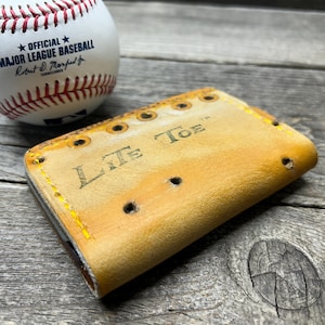 ¡Billetera vintage con forma de guante de béisbol Rawlings!