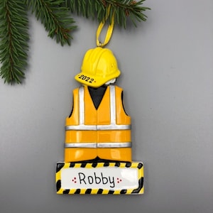 Gepersonaliseerd ornament bouwvakker, ornament geel veiligheidsvest, ornament veiligheidshelm, technisch kerstornament