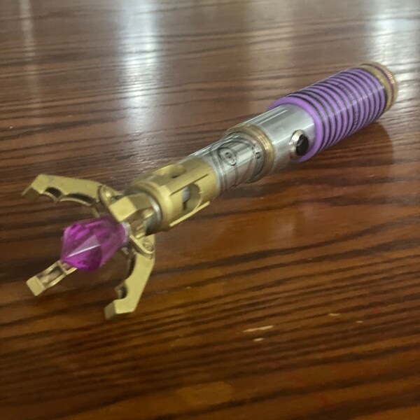 Custom Sonic Screwdriver with lights and sound. Includes your initials on handle in Gallifrey symbols.