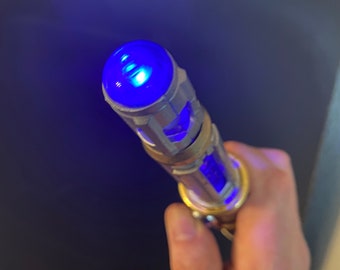 10/11 Doctor Sonic Screwdriver with lights, sound, and leather handle.