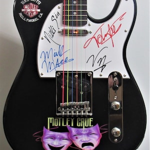 Motley Crue Autographed Guitar