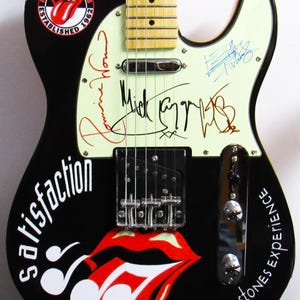 The Rolling Stones Autographed Guitar