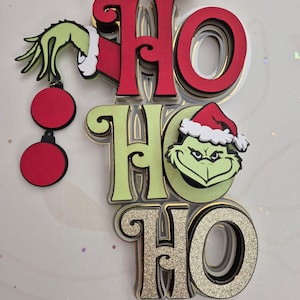 クリスマスケーキトッパー、ホーホーホーグリンチ。 Cameo および Cricut 用のデジタル カット ファイル。デザイン全体が含まれます。メリークリスマス、メリークリスマス