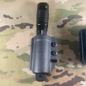Kydex flashlight holder 1.25 inch tube.