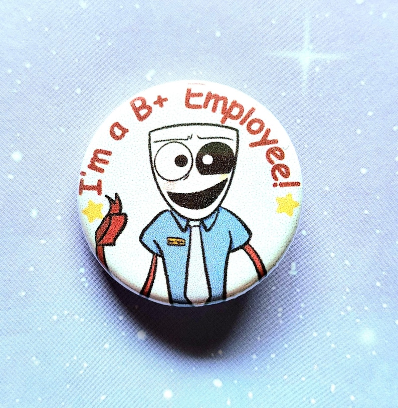 K&ouml;nnte beinhalten: Ein runder Button mit einer Comicfigur in einem blauen Hemd und Krawatte. Der Text "I'm a B+ Employee!" ist in Rot um die Figur gedruckt. Zwei gelbe Sterne befinden sich auf dem Button.