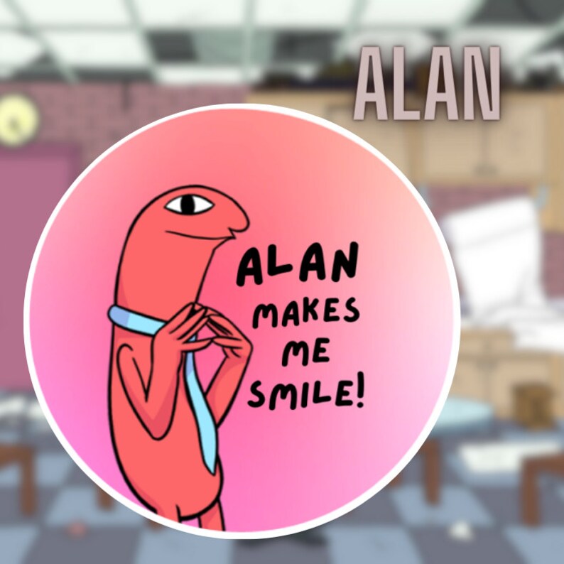 Digital version of the Alan button against a blurred image of the Smiling Friends office. Two fingers hold up the small button. The text on the button says Alan Makes Me Smile!