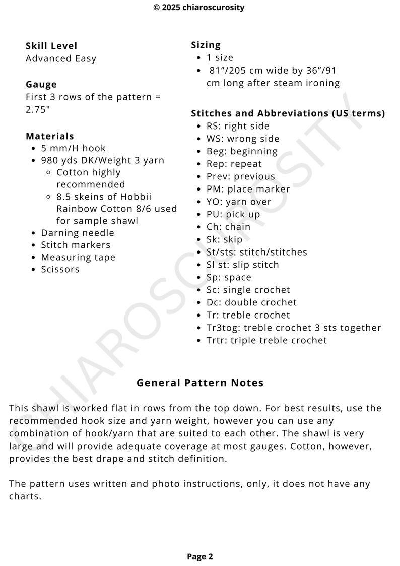 May include: A crochet pattern page with text detailing skill level, gauge, materials, sizing (205 cm x 91 cm), and stitch abbreviations. Includes a list of materials like a 5 mm hook and yarn. The pattern is for a shawl.