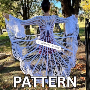 May include: A white crochet cardigan featuring an intricate spiderweb pattern that radiates from the centre back, with long, flared sleeves and an open front design. The garment includes a watermark label reading CHIAROSCUROSITY.