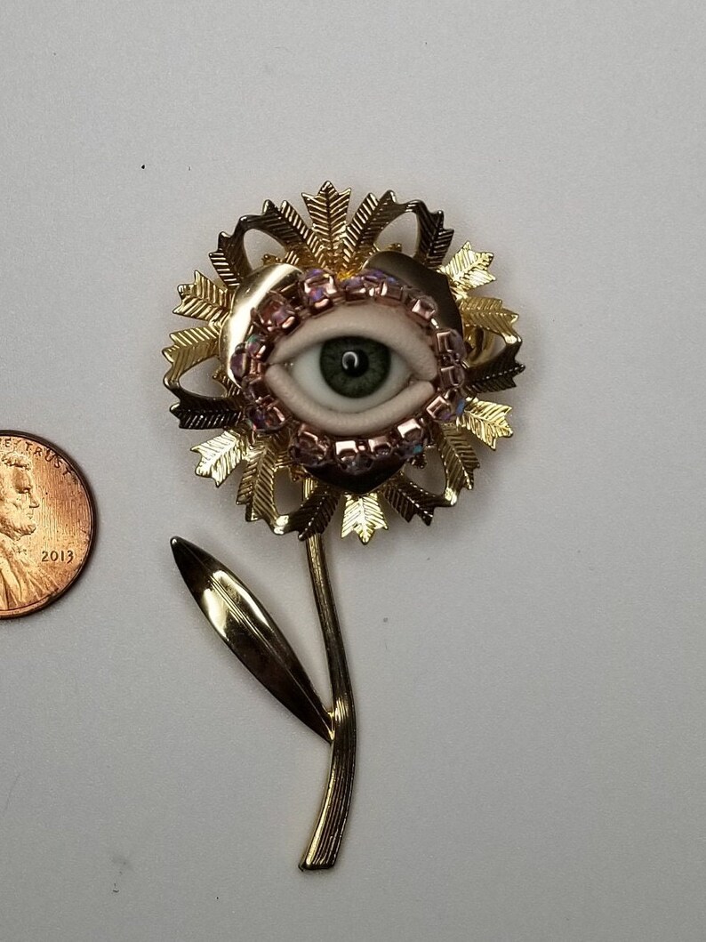 Fancy Flower Wink Gold toned vintage brooch glass doll eye. OOAK mixed media jewelry. Floral fantasy art. image 1