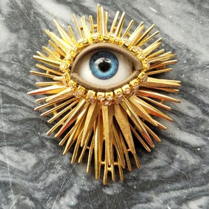 Sacred Wink II- Vintage brooch. Spiky goldtone statement piece.  (Also, available in SILVERTONE - Pls. message me)