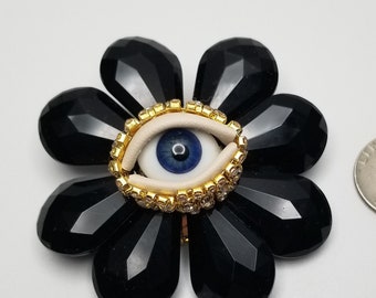 Black Flower Wink - Vintage brooch. Striking mixed media art pin. Goldtone statement piece. Unique gift.